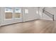 Spacious living room with hardwood floors and lots of natural light at 13415 Laxness St, Orlando, FL 32827