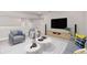 Comfortable loft living space with seating area at 13415 Laxness St, Orlando, FL 32827