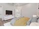 Main bedroom with plush bedding and ensuite bathroom at 13415 Laxness St, Orlando, FL 32827