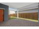 Private backyard patio with wooden fence at 13415 Laxness St, Orlando, FL 32827