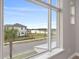 Lake and community view from a bedroom window at 13415 Laxness St, Orlando, FL 32827