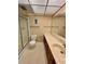 Bathroom with shower, toilet and double vanity at 1404 Oak Pl # J, Apopka, FL 32712