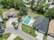 Two homes with private pools in a residential area at 1423 Grand Cayman Cir, Winter Haven, FL 33884