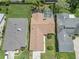 Aerial view of house and surrounding homes at 1423 Grand Cayman Cir, Winter Haven, FL 33884