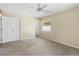 Bedroom with carpet flooring, window, and closet at 1423 Grand Cayman Cir, Winter Haven, FL 33884