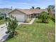 House exterior, front view at 1423 Grand Cayman Cir, Winter Haven, FL 33884