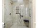 Large walk-in shower with glass enclosure and built-in seat at 1423 Grand Cayman Cir, Winter Haven, FL 33884