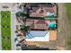 Aerial view of two houses under construction and two completed homes with pools at 16324 Vetta Dr, Montverde, FL 34756