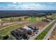 Luxury homes and golf course community with under construction houses at 16324 Vetta Dr, Montverde, FL 34756