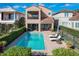 Aerial view of two-story house with pool and backyard at 16324 Vetta Dr, Montverde, FL 34756