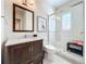 Clean bathroom, with a shower and marble vanity at 16324 Vetta Dr, Montverde, FL 34756