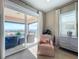 Bedroom with access to private balcony and view at 16324 Vetta Dr, Montverde, FL 34756