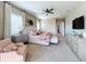 Main bedroom with king bed and sitting area at 16324 Vetta Dr, Montverde, FL 34756