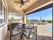 Outdoor patio with table and chairs, adjacent to refreshing pool at 16324 Vetta Dr, Montverde, FL 34756
