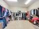 Large walk-in closet with ample storage space at 16324 Vetta Dr, Montverde, FL 34756