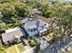 Aerial shot of a home showcasing the surrounding mature trees and proximity to nearby amenities at 2315 Depauw Ave, Orlando, FL 32804