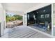 View of living room from balcony with modern furniture and a balcony view at 2315 Depauw Ave, Orlando, FL 32804
