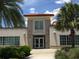 College Park Community Center featuring large windows, stucco facade and lush landscaping in a park-like setting at 2315 Depauw Ave, Orlando, FL 32804