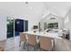Open concept dining room with large marble table and access to the backyard at 2315 Depauw Ave, Orlando, FL 32804