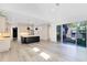Modern kitchen with island, stainless steel appliances, and white cabinets at 2315 Depauw Ave, Orlando, FL 32804
