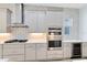 Modern kitchen with double oven and wine cooler at 2315 Depauw Ave, Orlando, FL 32804