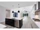 Modern kitchen with a large island and stainless steel appliances at 2315 Depauw Ave, Orlando, FL 32804