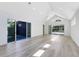 Bright and airy living room with high ceilings and sliding glass doors leading to a patio at 2315 Depauw Ave, Orlando, FL 32804