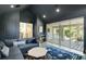 Living room with an open walk-out balcony, grey walls, recessed lighting, and luxury furniture at 2315 Depauw Ave, Orlando, FL 32804