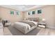 Stylishly furnished main bedroom with ample space, sleek furniture, and lots of natural light at 2315 Depauw Ave, Orlando, FL 32804