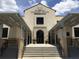 Exterior shot of the main entrance to Princeton Elementary School with grand staircase and overhang at 2315 Depauw Ave, Orlando, FL 32804