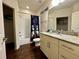 Clean bathroom with granite countertop, tub, and shower at 3208 Oyster Ln, Kissimmee, FL 34747