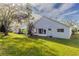 House with backyard and grassy area at 3667 Kingswood Ct, Clermont, FL 34711