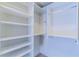Spacious closet with shelving and hanging rods at 3667 Kingswood Ct, Clermont, FL 34711