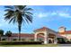 Community clubhouse with red tile roof at 3667 Kingswood Ct, Clermont, FL 34711