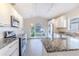 Modern kitchen with stainless steel appliances and granite countertops at 3667 Kingswood Ct, Clermont, FL 34711