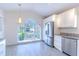Modern kitchen with stainless steel appliances and granite countertops at 3667 Kingswood Ct, Clermont, FL 34711