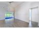 Open living area with sliding doors to the porch at 3667 Kingswood Ct, Clermont, FL 34711