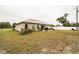 Large backyard with grassy area and privacy fence at 459 Abeno Ave, Deltona, FL 32725