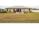 Spacious backyard with patio and grill at 459 Abeno Ave, Deltona, FL 32725