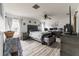 Bright bedroom featuring a comfortable bed, dresser, and workspace at 459 Abeno Ave, Deltona, FL 32725