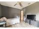 Bright bedroom with a double bed and a TV at 459 Abeno Ave, Deltona, FL 32725