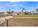 House exterior with a neat lawn and a sidewalk leading to the entrance at 459 Abeno Ave, Deltona, FL 32725