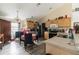 Eat-in kitchen with a dining table and view into the living room at 459 Abeno Ave, Deltona, FL 32725