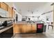 Kitchen boasts ample counter space and modern appliances at 459 Abeno Ave, Deltona, FL 32725