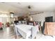 Open living and dining area with a view of the kitchen at 459 Abeno Ave, Deltona, FL 32725