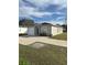 Newly built single-story house featuring a garage and a neatly landscaped yard at 4660 Carter St, Orlando, FL 32811