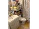 Bathroom with updated vanity and shower, offering ample storage at 5271 Images Cir # 108, Kissimmee, FL 34746