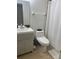 Clean bathroom with a toilet, sink, and shower at 5271 Images Cir # 108, Kissimmee, FL 34746
