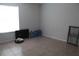 Spacious bedroom with tile flooring, large window, and neutral walls at 5271 Images Cir # 108, Kissimmee, FL 34746