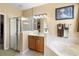 Clean bathroom with a shower/tub combo and a double sink vanity at 590 Michigan Estates Cir, St Cloud, FL 34769